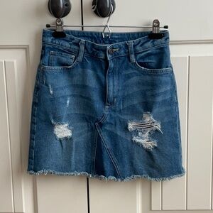 Junior’s destructed denim skirt